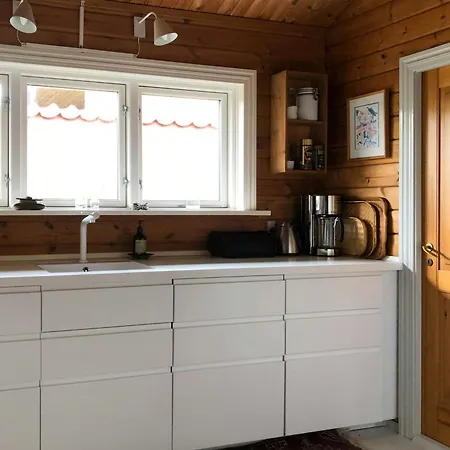 Log House Near Beautiful Nature In